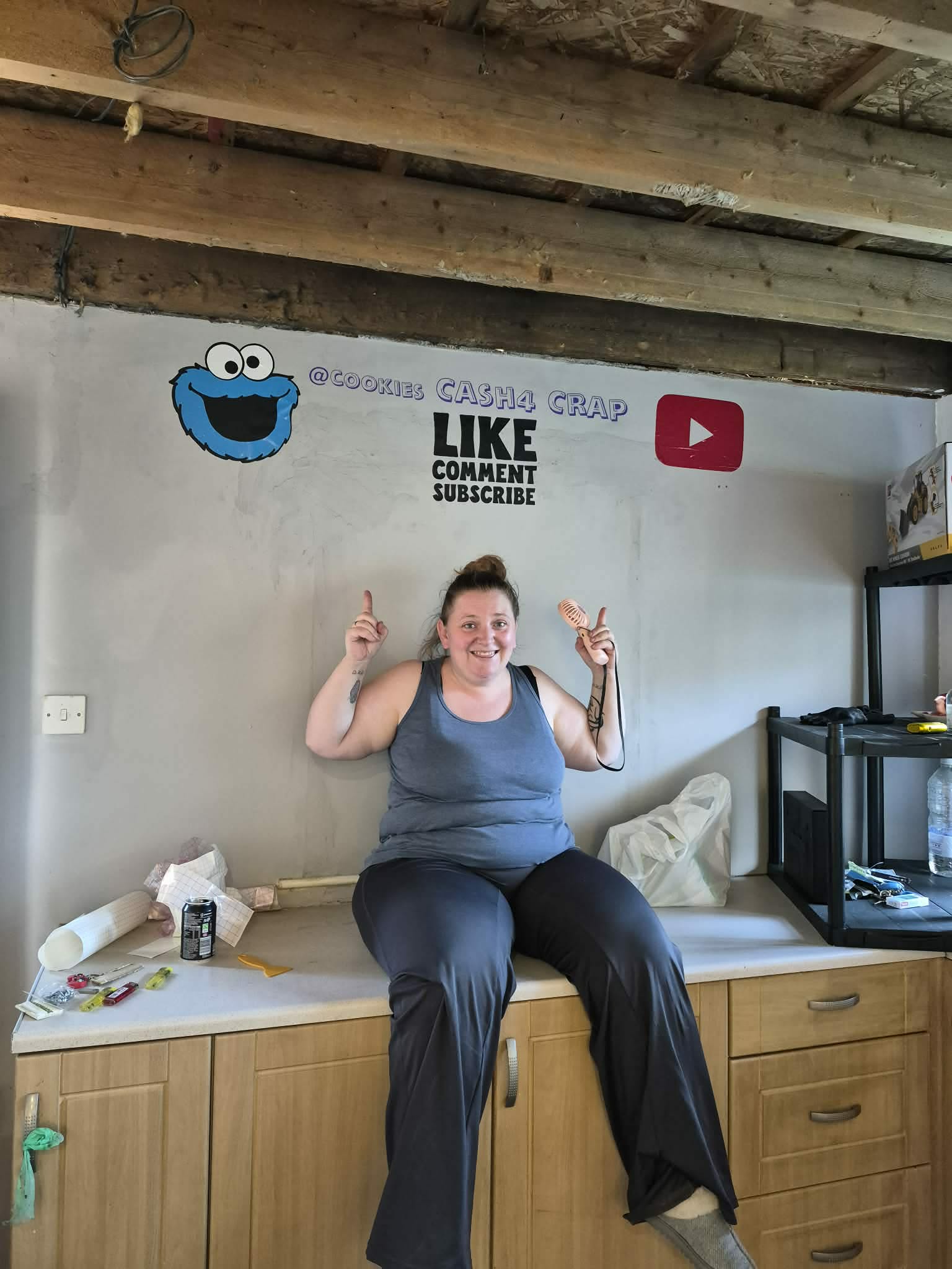 Jo holding a microphone in the Cookie crew studio
